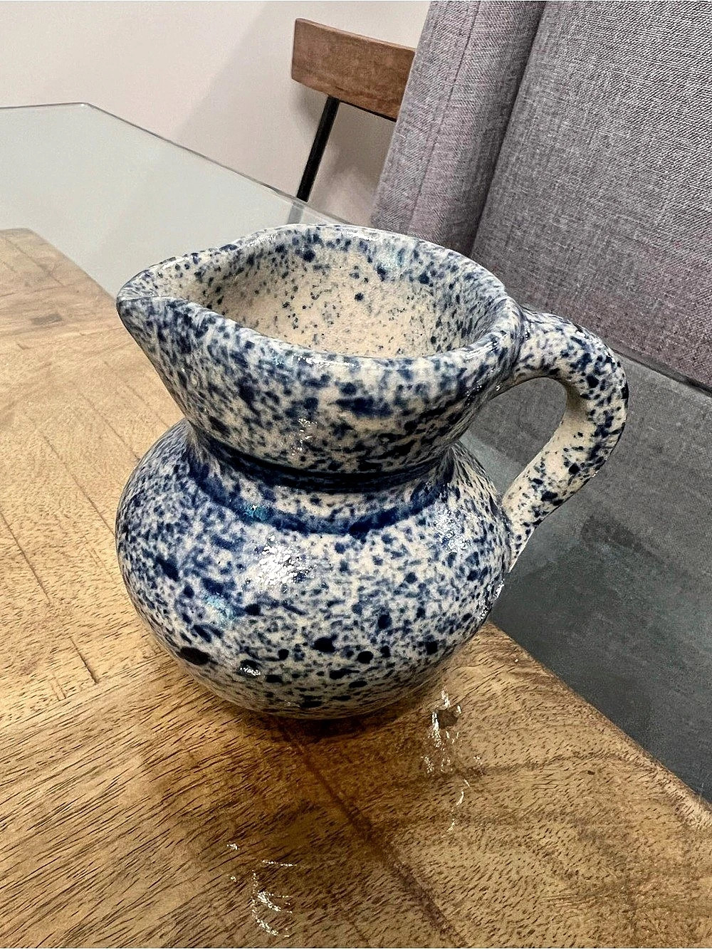 pitcher creamer with a blue and white spongeware or spatterware speckled glaze s